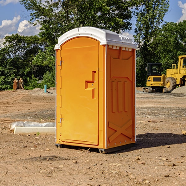 how often are the portable restrooms cleaned and serviced during a rental period in Russellville IL